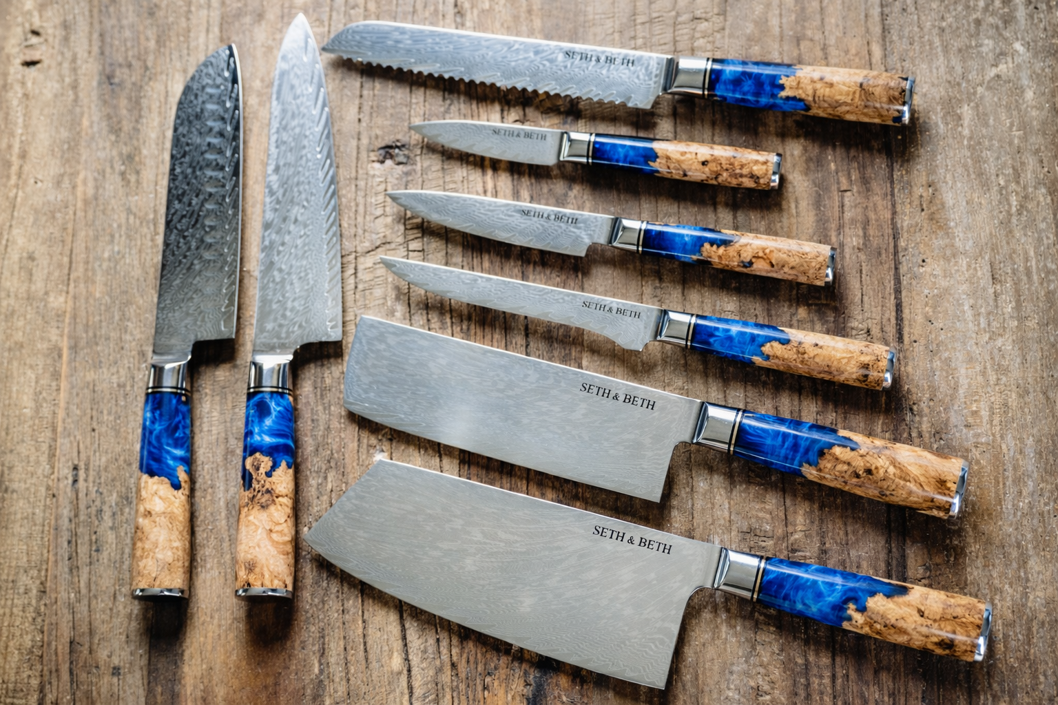 Blue burl handle close-up on personalized engraved Damascus knife — Tidal Series
