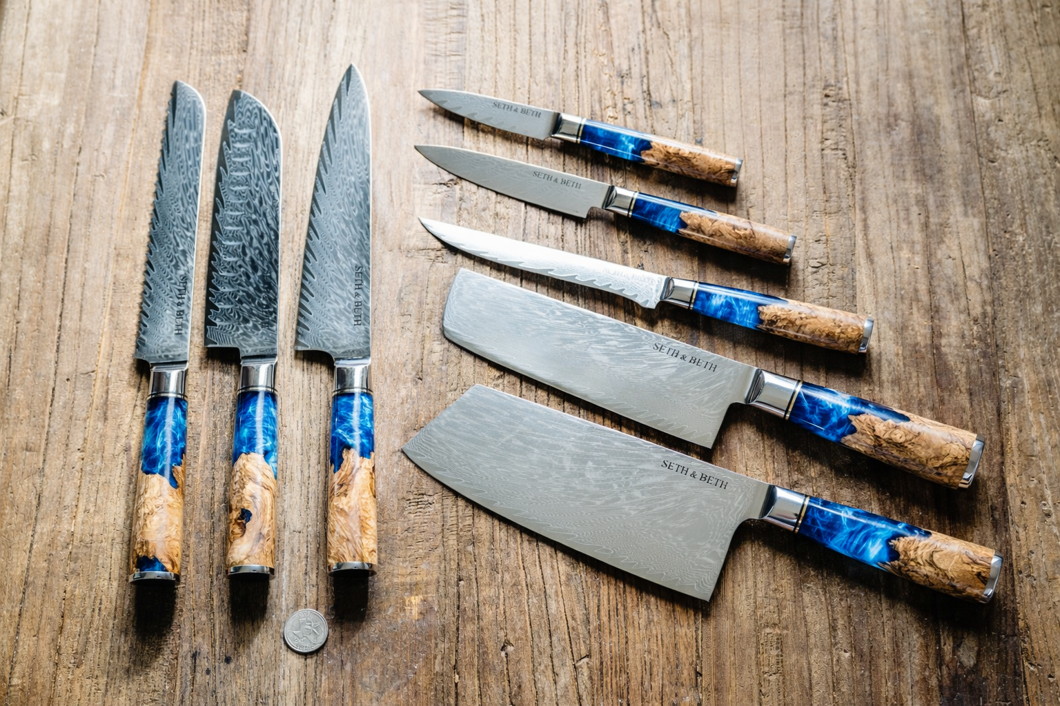Blue burl handle close-up on personalized engraved Damascus knife — Tidal Series