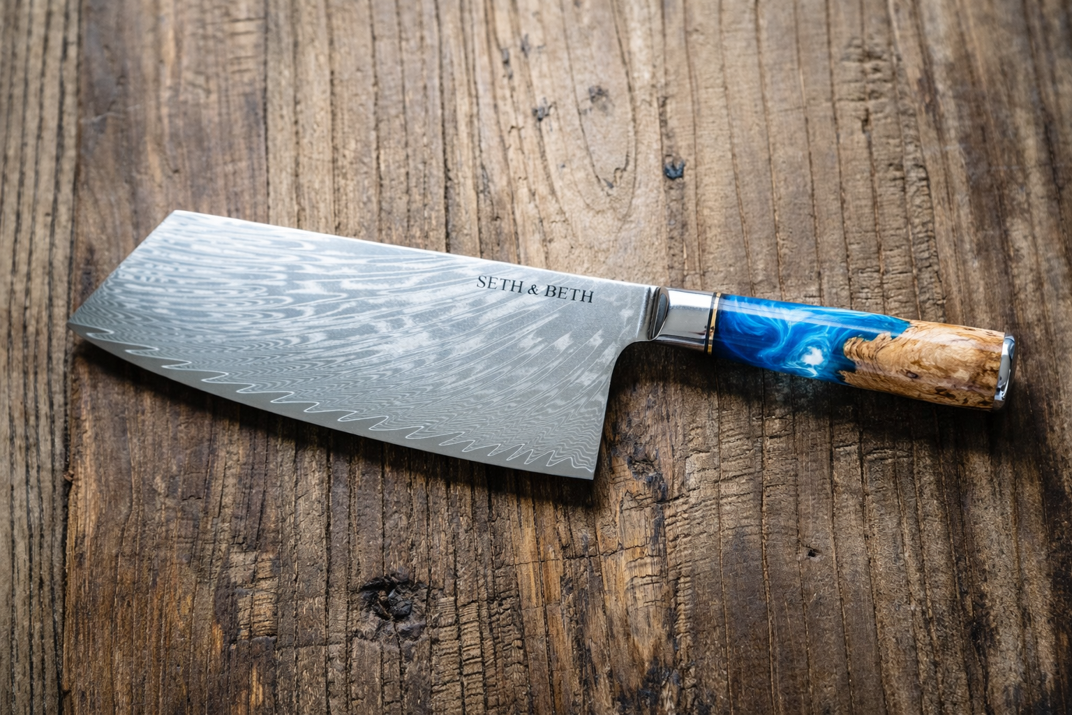 Blue burl handle close-up on personalized engraved Damascus knife — Tidal Series